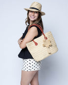 Nomena Braided Straw Basket Handbag handmade braided natural raffia palm fiber in a solid hue of natural straw color woven into concentric horizontal bands of subtle texture spiraling around the bag with leather handles beach bag shoulder bag purse - Shebobo (with Fedra 2" Brim Fedora Unisex Straw Hats)