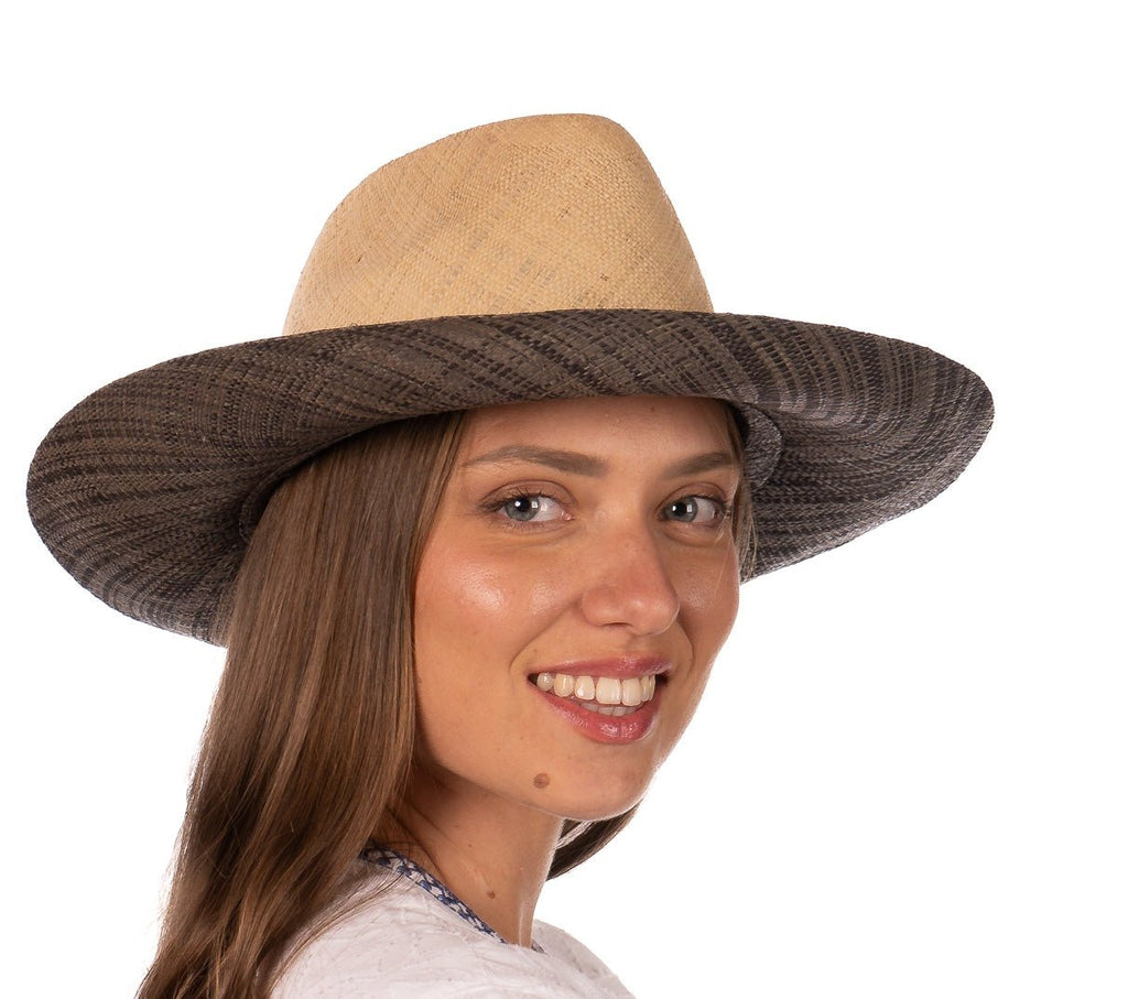 Model wearing 3" Brim Panama Unisex Two Tone Straw Hats handmade loomed raffia palm fiber in a solid hue of natural straw color on the crown and solid grey on the brim with matching attached hat band lightweight breathable uv/sun protection straw sun hat - Shebobo