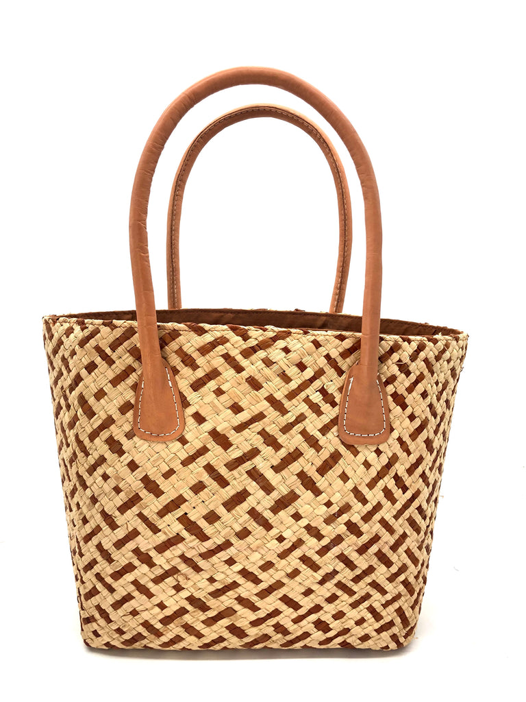 Pianina Cinnamon Two Tone Small Straw Basket Bag handmade from woven natural raffia palm fiber in a two tone cross weave pattern of natural straw color and cinnamon/tobacco/brown handbag purse with leather handles - Shebobo