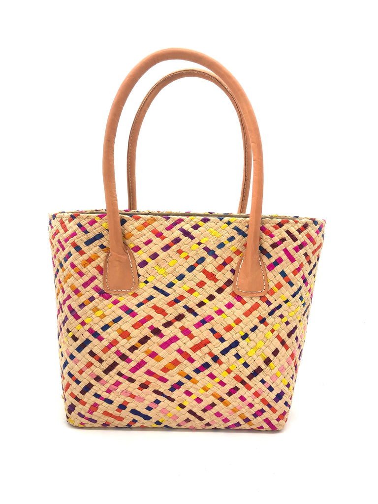 Pianina Confetti Multi Small Straw Basket Bag handmade from woven natural raffia palm fiber in a multicolor cross weave pattern of natural straw color, coral orange, orchid purple, bordeaux red, fuchsia pink, light pink, saffron yellow, yellow, and navy blue handbag purse with leather handles - Shebobo