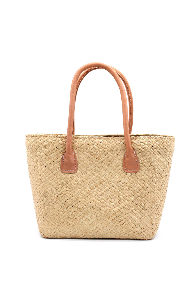 Pianina Natural Small Straw Basket Bag handmade from woven natural raffia palm fiber in a monochromatic cross weave pattern of natural straw color handbag purse with leather handles - Shebobo