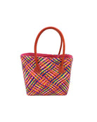 Pianina Raspberry Multi Small Straw Basket Bag handmade from woven natural raffia palm fiber in a multicolor cross weave pattern of turquoise blue, coral orange, orchid purple, bordeaux red, fuchsia pink, light pink, saffron yellow, yellow, and navy blue handbag purse with leather handles - Shebobo