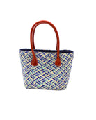 Pianina Azure Multi Small Straw Basket Bag handmade from woven natural raffia palm fiber in a multicolor cross weave pattern of turquoise, denim retro/light/blue, natural straw color, and navy blue handbag purse with leather handles - Shebobo