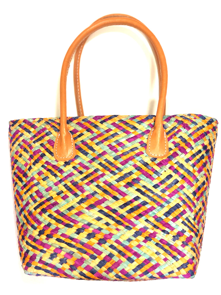 Pianina Turquoise Multi Small Straw Basket Bag handmade from woven natural raffia palm fiber in a multicolor cross weave pattern of turquoise blue, melon orange, orchid purple, and navy blue handbag purse with leather handles - Shebobo