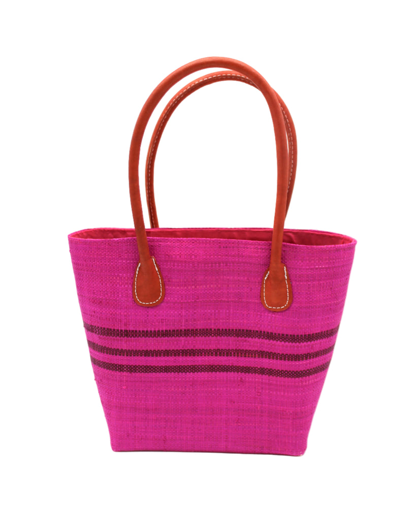 Raja Racing Stripe Straw Basket Bag handmade loomed natural raffia palm fiber in a two tone multicolor design of Fuchsia hot/bright/barbie/pink color with three horizontal bands of Umberwine bordeaux/claret/dark/purple/red creating a racing stripe pattern placed under the base of the handles a third down the height of the bag - Shebobo