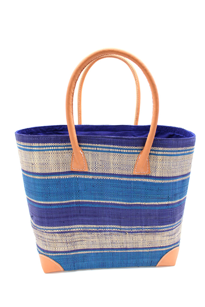 Rayo Stripes Straw Basket Bag Blue Swirl Multicolor navy blue, turquoise blue and natural straw color multiple width horizontal stripe pattern handmade loomed natural raffia palm fiber  tote beach bag - Shebobo