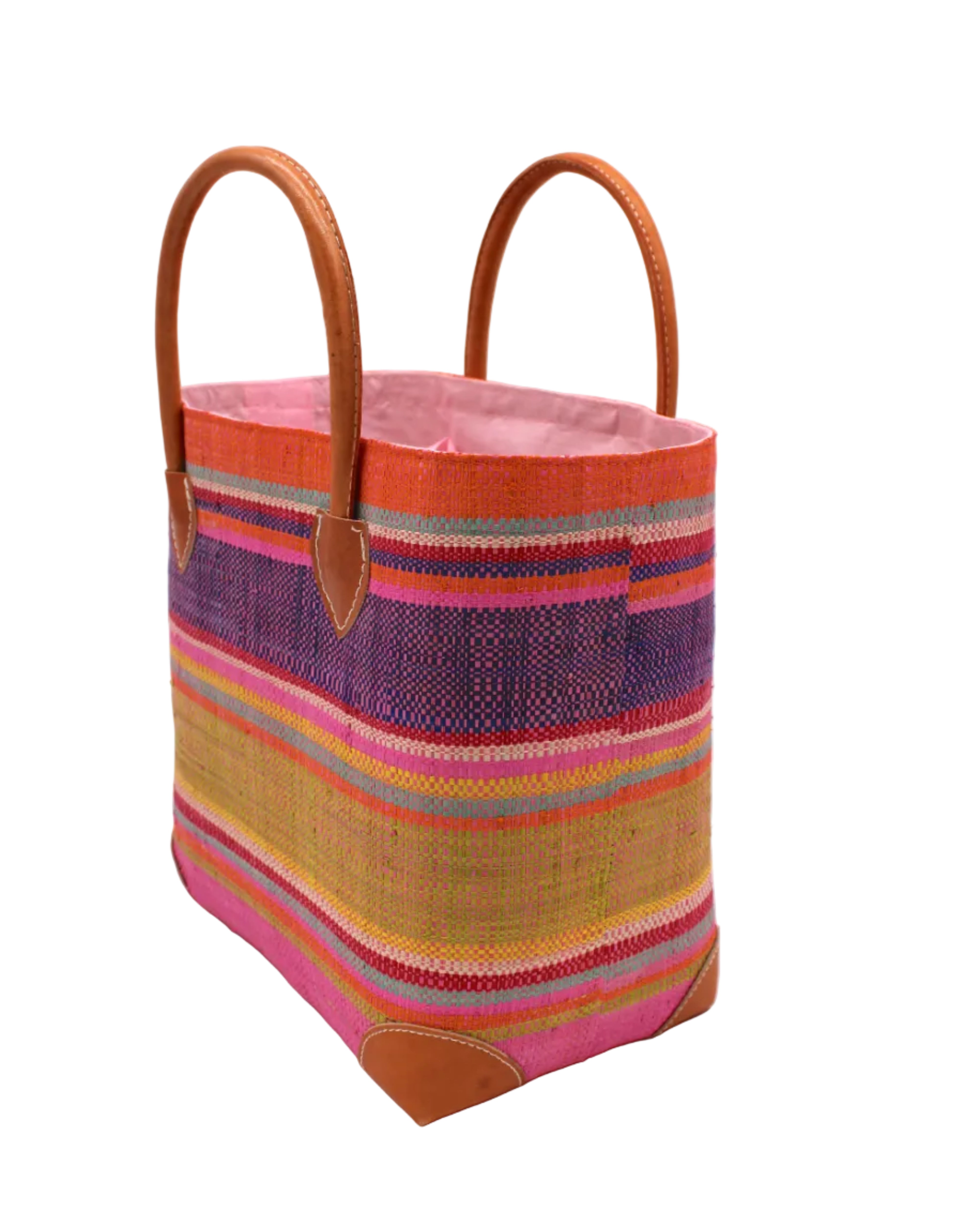 Side view Rayo Stripes Straw Basket Bag Raspberry Swirl handmade loomed natural raffia palm fiber in a multicolor multi width horizontal stripe pattern of coral orange, red, purple, midori lime/green, light pink, yellow, blue, and natural straw color, etc. with leather handles and accents tote beach bag - Shebobo