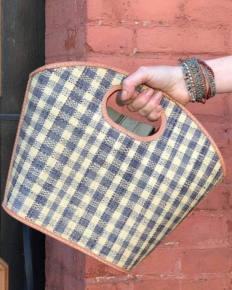 Model wearing Ricky Grey Gingham Straw Bucket Handbag handmade loomed raffia purse grey and natural straw color plaid pattern bag - Shebobo