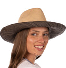 Model wearing Riley 3" Brim Panama Unisex Two Tone Straw Hats handmade loomed raffia palm fiber in a solid hue of natural straw color on the crown and solid grey on the brim with matching attached hat band lightweight breathable uv/sun protection straw sun hat - Shebobo