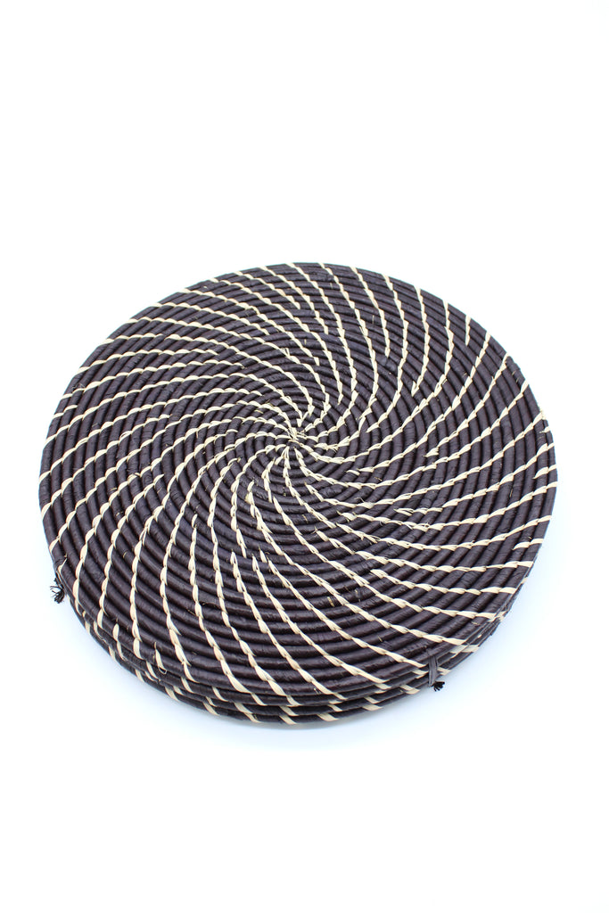 Round Two Tone Swirl Raffia Straw Coasters & Placemats Set of 6 handmade natural raffia palm fiber in a crochet loop disc technique creating concentric circular stripe pattern of texture in a solid hue of black with contrasting knotted spiral swirl weave in natural straw color sets of six placemats or coasters - Shebobo