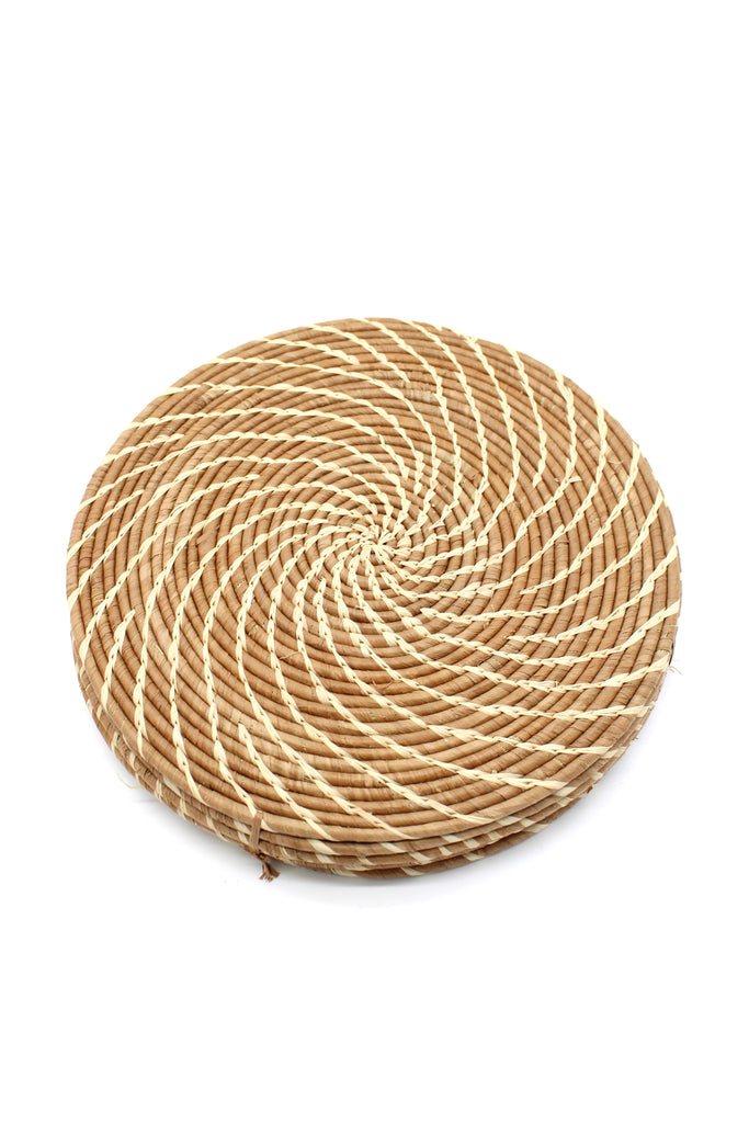 Round Two Tone Swirl Raffia Straw Coasters & Placemats Set of 6 handmade natural raffia palm fiber in a crochet loop disc technique creating concentric circular stripe pattern of texture in a solid hue of cinnamon/tobacco/brown with contrasting knotted spiral swirl weave in natural straw color sets of six placemats or coasters - Shebobo