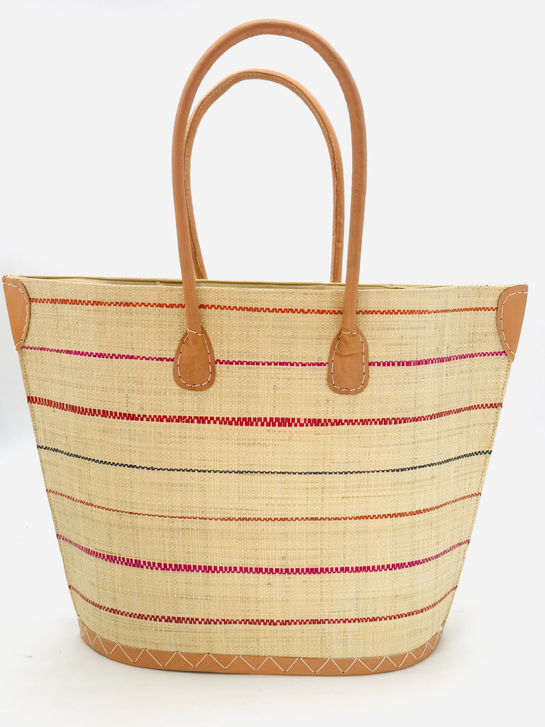 Santa Cruz Multi Pinstripes Small Straw Tote Bag handmade loomed raffia in a wide stripe of natural straw color with multicolor multicolor thin stripes of coral red/orange, fuchsia pink, and navy bluein a horizontal pinstripe pattern handbag with leather handles and details beach bag - Shebobo