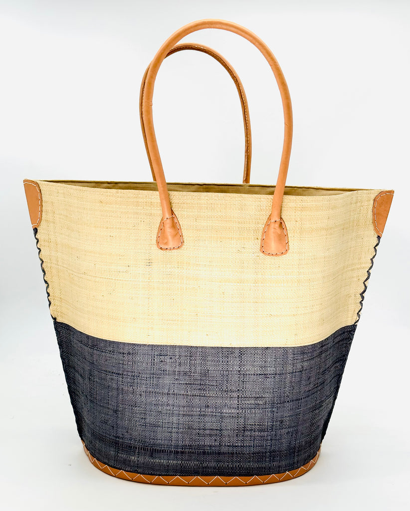 Santa Cruz Two Tone Large Straw Tote Bag handmade loomed raffia in a color block pattern with natural straw color on the top half and black on the bottom half plus leather handles and details extra large handbag beach bag - Shebobo