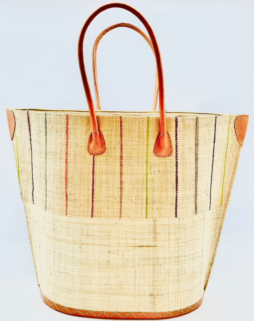 Santa Cruz Two Tone Pinstripes Brights Large Straw Tote Bag handmade loomed raffia in a wide stripe of natural straw color with multicolor thin stripes of fuchsia pink, tea brown, lime green, bordeaux red, grey, and coral red/orange in a vertical pinstripe pattern on the top half and solid natural on the bottom half handbag with leather handles and details beach bag - Shebobo