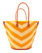 Santa Cruz Wide Stripe Chevron Large Straw Tote Bag handmade loomed raffia palm fiber in a two tone diagonal even width bands of color in a wide stripe chevron pattern of saffron orange/yellow and natural straw color on the front and a matching solid hue on the back with leather accents and handles large shoulder bag - Shebobo