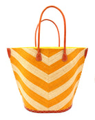 Santa Cruz Wide Stripe Chevron Large Straw Tote Bag handmade loomed raffia palm fiber in a two tone diagonal even width bands of color in a wide stripe chevron pattern of saffron orange/yellow and natural straw color on the front and a matching solid hue on the back with leather accents and handles large shoulder bag - Shebobo