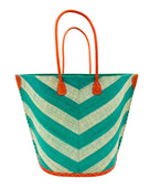 Santa Cruz Wide Stripe Chevron Large Straw Tote Bag handmade loomed raffia palm fiber in a two tone diagonal even width bands of color in a wide stripe chevron pattern of teal green/blue and natural straw color on the front and a matching solid hue on the back with leather accents and handles large shoulder bag - Shebobo