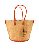 Santa Ynez Cappuccino Woven Small Straw Tote Bag with Tassel Charm Embellishment handmade woven raffia palm fiber in a solid hue of cappuccino tea/light/brown creating a subtle wide cross weave texture with matching crochet topped multi tuft tassel embellishment and leather handles shoulder bag beach bag - Shebobo