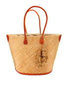 Santa Ynez Cappuccino Woven Small Straw Tote Bag with Tassel Charm Embellishment handmade woven raffia palm fiber in a solid hue of cappuccino tea/light/brown creating a subtle wide cross weave texture with matching crochet topped multi tuft tassel embellishment and leather handles shoulder bag beach bag - Shebobo