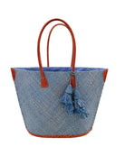Santa Ynez Woven Small Straw Tote Bag with Tassel Charm Embellishment handmade woven raffia palm fiber in a solid hue of denim retro/light/blue with matching tassel tie charm embellishment and leather handles beach bag - Shebobo