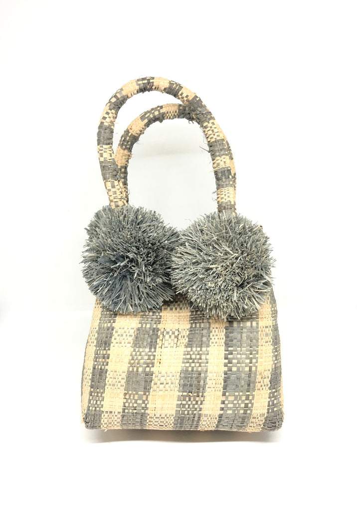 Schooner Straw Mini Bag with Pompom Accent handmade loomed raffia in a petite gingham pattern of grey and natural small handbag with four solid grey color pompom embellishments attached at the handles purse - Shebobo