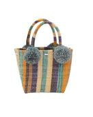 Schooner Olive & Blue Swirl Stripe Straw Mini Bag with Pompom Accent handmade loomed natural raffia palm fiber in multi width vertical multicolor stripe pattern of olive green, denim light/blue, turquoise blue, navy/dark/blue, black, cappuccino light/brown, saffron yellow/orange, and natural straw color with four matching raffia pompom embellishments at the base of each handle attachment tiny purse extra small handbag - Shebobo