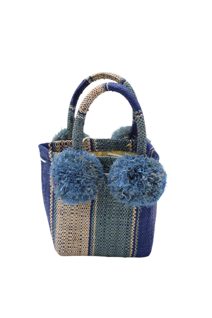 Schooner Blue Swirl Straw Mini Bag with Pompom Accent handmade loomed natural raffia palm fiber in multi width vertical multicolor stripe pattern of dusk/navy/dark/blue, turquoise blue/green, and natural straw color with four matching raffia pompom embellishments at the base of each handle attachment tiny purse extra small handbag - Shebobo