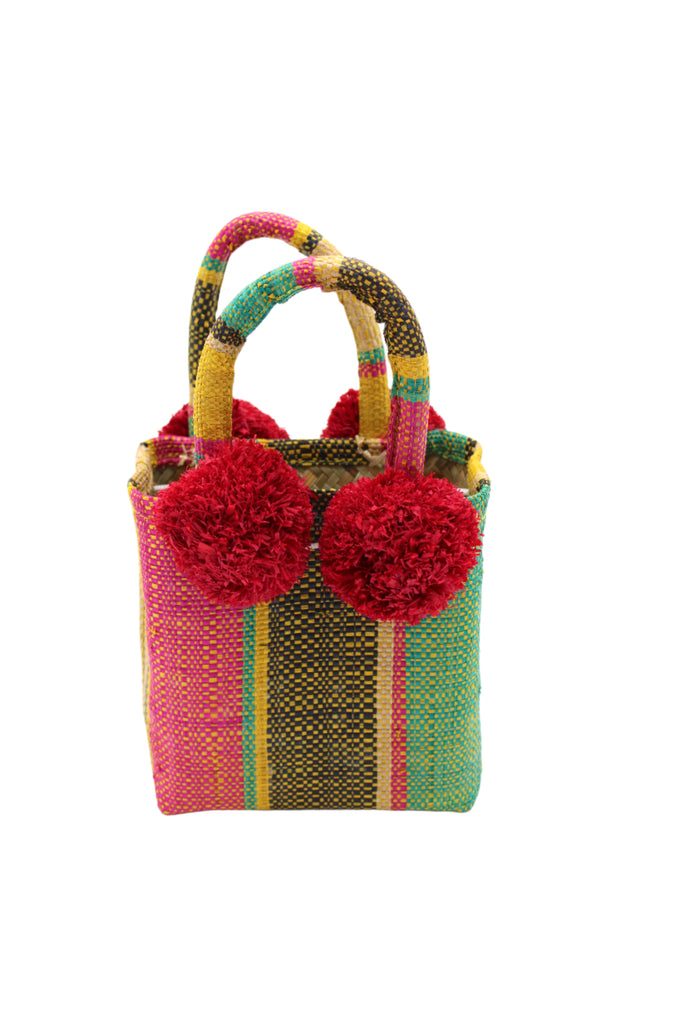 Schooner Carmalita Swirl Straw Mini Bag with Pompom Accent handmade loomed natural raffia palm fiber in multi width vertical multicolor stripe pattern of fuchsia hot/bright/barbie/pink, saffron yellow, teal dark/green/blue, black, and natural straw color with four matching raffia pompom embellishments at the base of each handle attachment tiny purse extra small handbag - Shebobo
