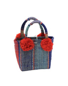 Schooner Coral & Turquoise Swirl Straw Mini Bag with Pompom Accent handmade loomed natural raffia palm fiber in multi width vertical multicolor stripe pattern of turquoise blue/green, denim light/retro/blue, navy dark/blue, coral orange/red and natural straw color with four matching raffia pompom embellishments at the base of each handle attachment tiny purse extra small handbag - Shebobo