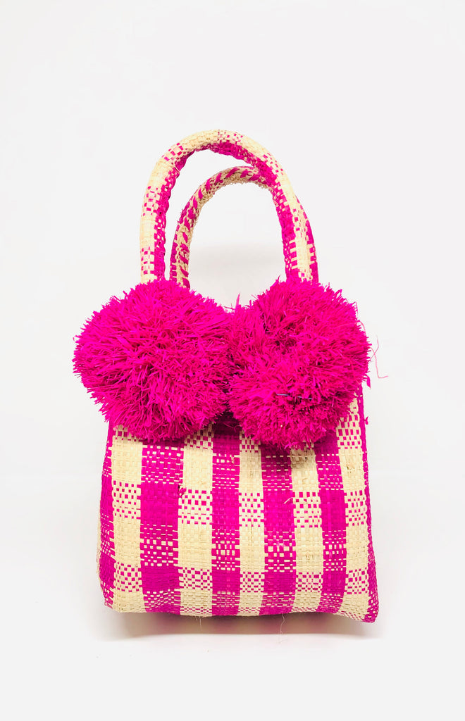 Schooner Fuchsia Gingham Straw Mini Bag with Pompom Accent handmade loomed natural raffia palm fiber in two tones of fuchsia pink and natural straw color small gingham plaid pattern with four fuchsia raffia pompom embellishments at the base of each handle attachment tiny purse extra small handbag - Shebobo