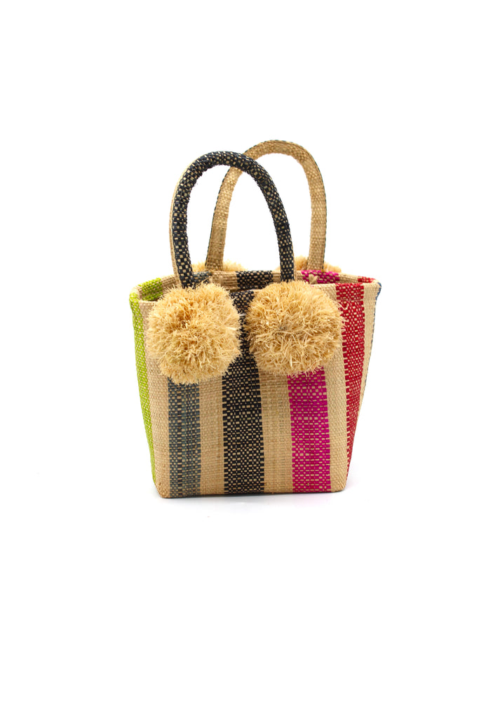 Schooner Multi Stripe Straw Mini Bag with Pompom Accent handmade loomed natural raffia palm fiber in multi width vertical multicolor stripe pattern of natural straw color, red, orange, lime green, turquoise blue, navy blue, black, fuchsia pink,etc. with four matching raffia pompom embellishments at the base of each handle attachment tiny purse extra small handbag - Shebobo