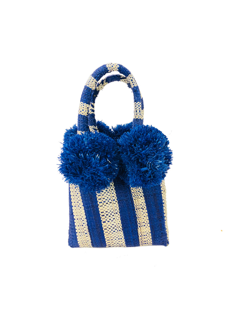 Schooner  Navy Stripe Straw Mini Bag with Pompom Accent handmade loomed natural raffia palm fiber in two tones of navy blue and natural straw color vertical stripe pattern with four blue raffia pompom embellishments at the base of each handle attachment tiny purse extra small handbag - Shebobo