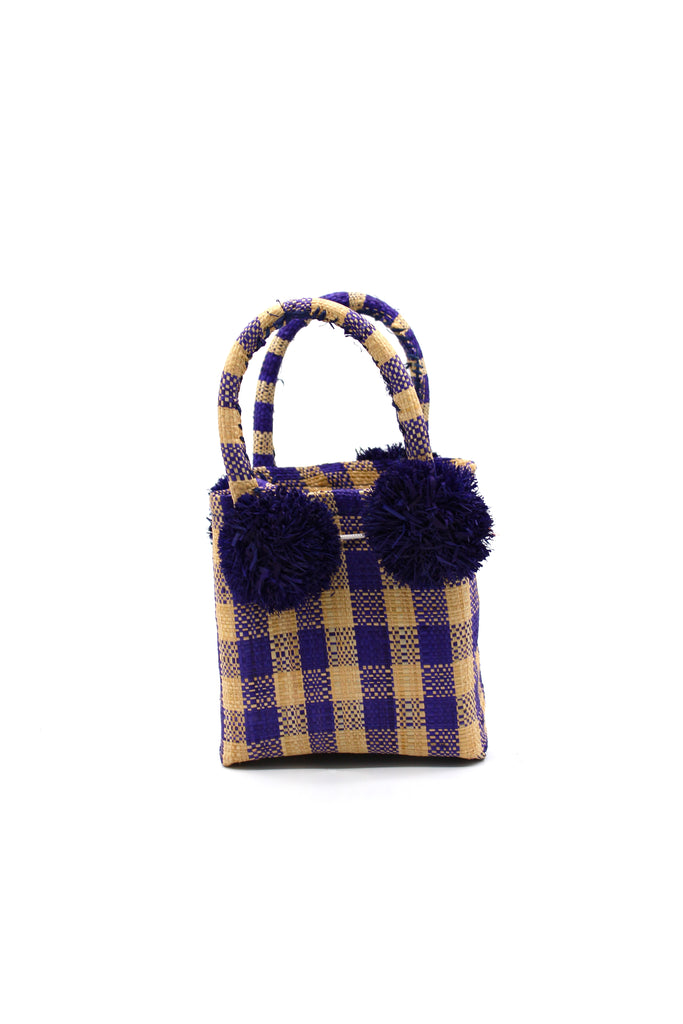 Schooner Navy Gingham Straw Mini Bag with Pompom Accent handmade loomed natural raffia palm fiber in two tones of navy blue and natural straw color small gingham plaid pattern with four navy raffia pompom embellishments at the base of each handle attachment tiny purse extra small handbag - Shebobo