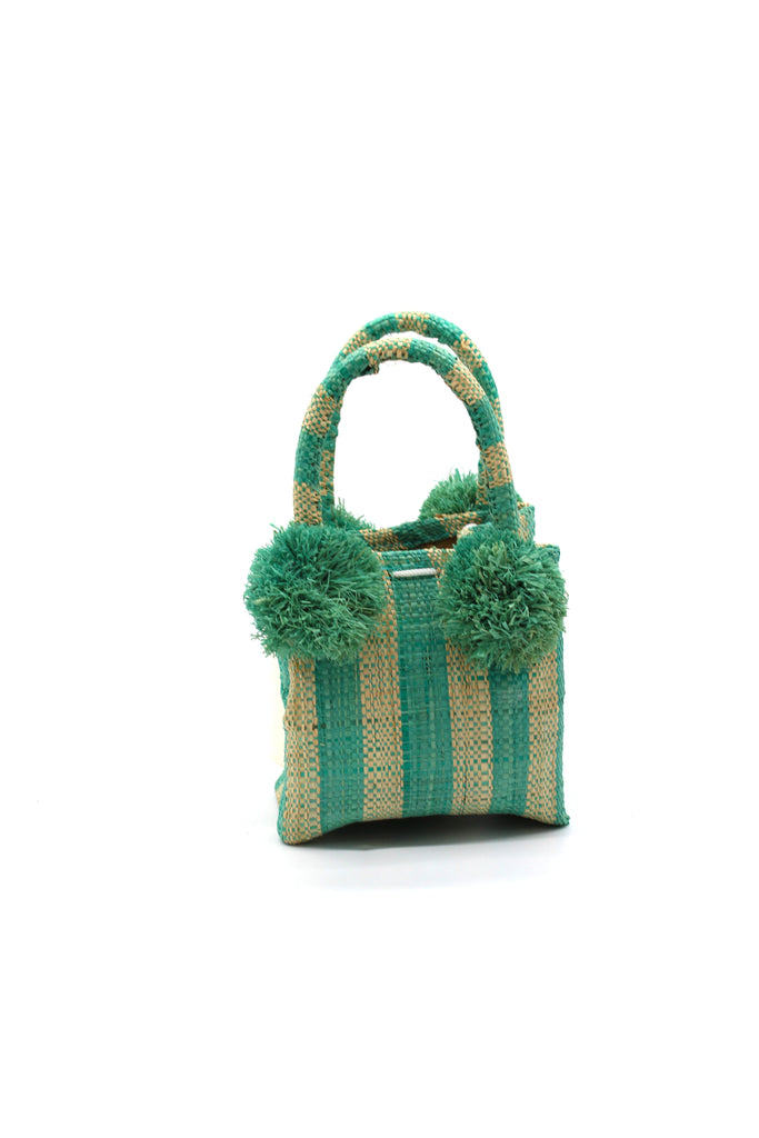 Schooner Seafoam Stripe Straw Mini Bag with Pompom Accent handmade loomed natural raffia palm fiber in two tones of seafoam blue/green and natural straw color vertical stripe pattern with four seafoam raffia pompom embellishments at the base of each handle attachment tiny purse extra small handbag - Shebobo