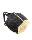 Bottom View Sea See Black Straw Shoulder Bag handmade woven raffia palm fiber in a solid hue of black making a diagonal link pattern with  natural straw color crochet circular bottom and vertical edging along the side panels creating a two tone multicolor handbag/beach bag/purse - Shebobo