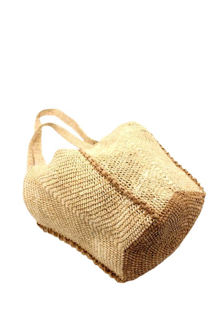 Bottom View Sea See Cappuccino Straw Shoulder Bag handmade woven raffia palm fiber in a solid hue of natural straw color making a diagonal link pattern with cappuccino light/brown/beige crochet circular bottom and vertical edging along the side panels creating a two tone multicolor handbag/beach bag/purse - Shebobo