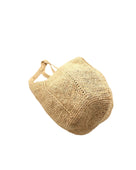 Bottom View Sea See Natural Straw Shoulder Bag handmade woven raffia palm fiber in a solid hue of natural straw color making a diagonal link pattern with matching crochet circular bottom and vertical edging along the side panels handbag/beach bag/purse - Shebobo
