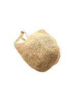 Bottom View Sea See Natural Straw Shoulder Bag handmade woven raffia palm fiber in a solid hue of natural straw color making a diagonal link pattern with matching crochet circular bottom and vertical edging along the side panels handbag/beach bag/purse - Shebobo