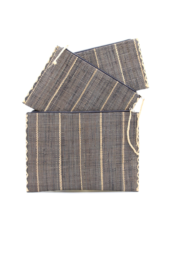 Set of 3 Grey Nesting Zippered Straw Clutches Pinstripe Pattern handmade loomed raffia in wide vertical bands of grey with narrow bands of natural straw color with matching zipper and braided zipper pull with cross stitch edging in three sizes of small, medium, and large - Shebobo