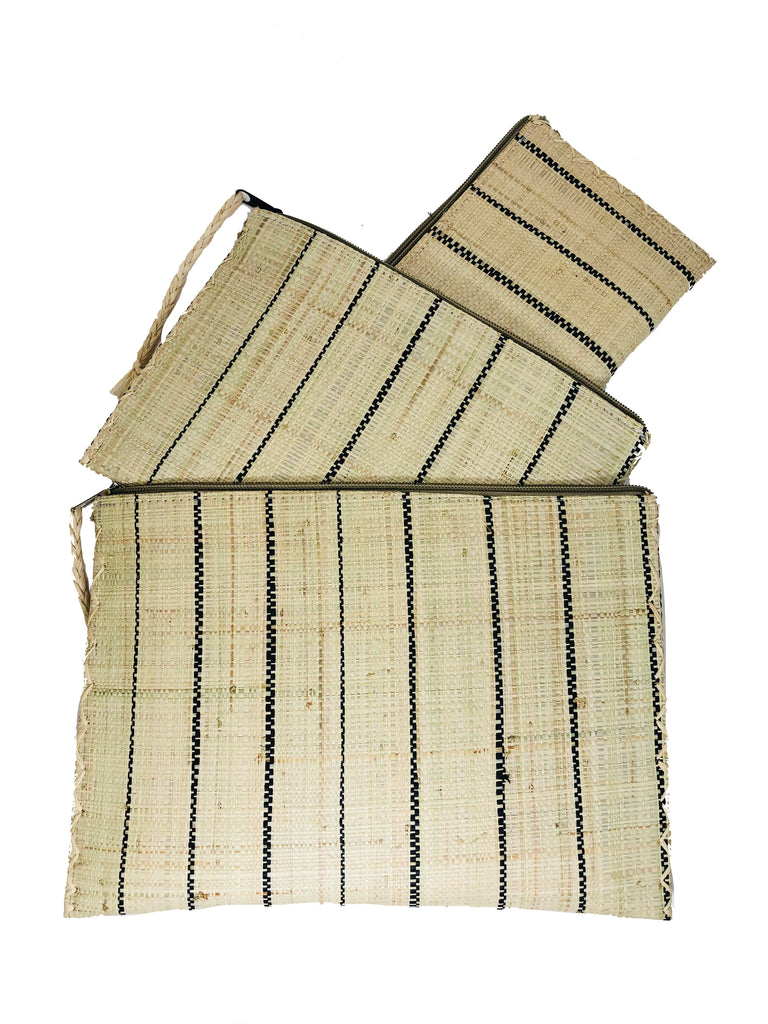 Set of 3 Natural Nesting Zippered Straw Clutches Pinstripe Pattern handmade loomed raffia in wide vertical bands of natural straw color with narrow bands of black with matching zipper and braided zipper pull with cross stitch edging in three sizes of small, medium, and large - Shebobo