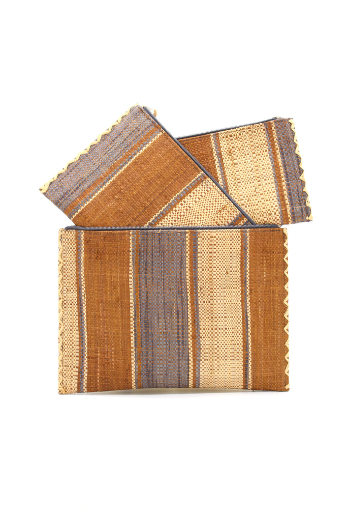 Set of 3 Nesting Zippered Straw Clutches Cinnamon Swirl Multicolor Stripe Pattern handmade loomed raffia in multiple widths of vertical stripes in natural, cinnamon/tobacco/brown, and grey with matching zipper and braided zipper pull with cross stitch edging in three sizes of small, medium, and large - Shebobo