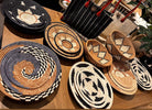 Assorted view Dakarai Raffia Straw Wall Decor Display Basket Trays: Set of 3 and Amara Raffia Straw Decor Display Basket Bowls: Set of 3 - handmade crochet natural raffia palm fiber in a concentric circle woven into display trays with incorporated patterns - Shebobo