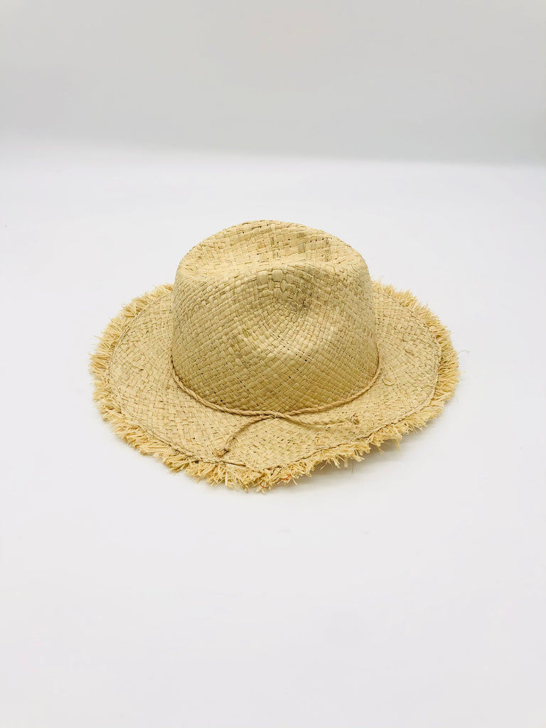 Side View Fiston Fringe Natural - Unisex Fedora Straw Hat with Raw Edge handmade woven raffia strands in a solid hue of natural straw color with matching raw fringe edge embellishment and twisted raffia cord hat band - Shebobo