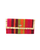 Sophie Watermelon Swirl Multicolor Stripes Straw Clutch handmade loomed raffia purse handbag  in muti-width vertical bands of lime green, fuchsia pink, red, orange, yellow, and black with matching cross stitch edging and natural straw color raw fringe edge envelope shaped bag - Shebobo