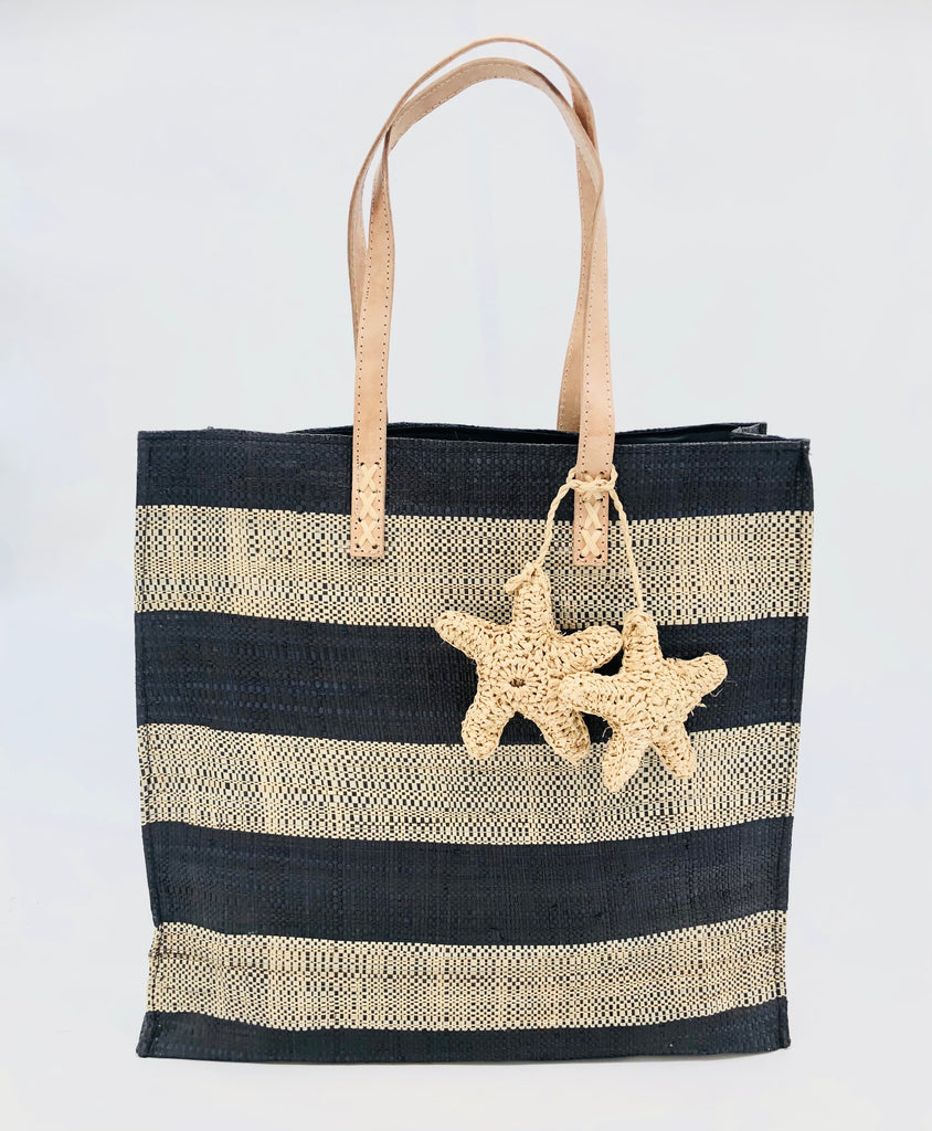 Starfish Black Straw Bag with Crochet Starfish Charm Embellishment handmade loomed raffia shopping tote in black and natural straw color horizontal wide stripe pattern handbag with leather handles - Shebobo