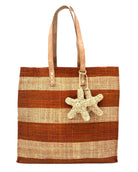 Starfish Whisky Straw Bag with Crochet Starfish Charm Embellishment handmade loomed raffia shopping tote in whisky red/brown and natural straw color horizontal wide stripe pattern handbag with leather handles - Shebobo