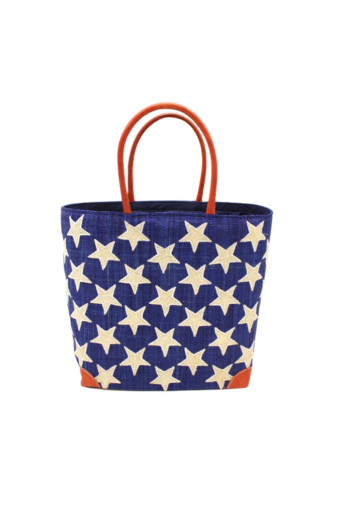 Stars Straw Basket Bag handmade loomed raffia palm fiber in a solid hue of Dusk navy/dark/blue with natural straw color loomed stars stitched on in a tight  diagonal pattern with leather handles Patriotic Americana Shoulder Bag Beach Bag - Shebobo