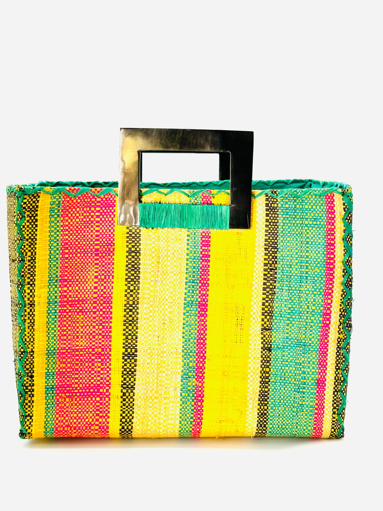 Stevie Square Carmalita Multicolor Stripe Straw Handbag with Horn Handles handmade loomed raffia with saffron yellow, turquoise blue, fuchsia pink, naural, and black varying width vertical stripe pattern purse with matching turquoise liner, cross stitch edging, and handle attachment - Shebobo