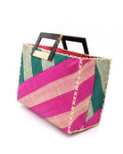 Side View Stevie Double Wide Stripe Fuchsia & Teal Square Straw Handbag with Horn Handles handmade loomed raffia palm fiber in even width wide stripe pattern of Fuchsia hot/bright/barbie/pink and natural straw color oriented on the diagonal of three quarters of the bag with matching stripe pattern of Teal dark/blue/green and natural diagonally on the top left corner quarter shoulder bag handbag - Shebobo