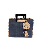Stevie Square Black Multicolor Straw Handbag with Horn Handles handmade loomed raffia in black purse with matching liner, contrasting natural cross stitch edging, handle attachment, and crochet doily tassel charm embellishment - Shebobo